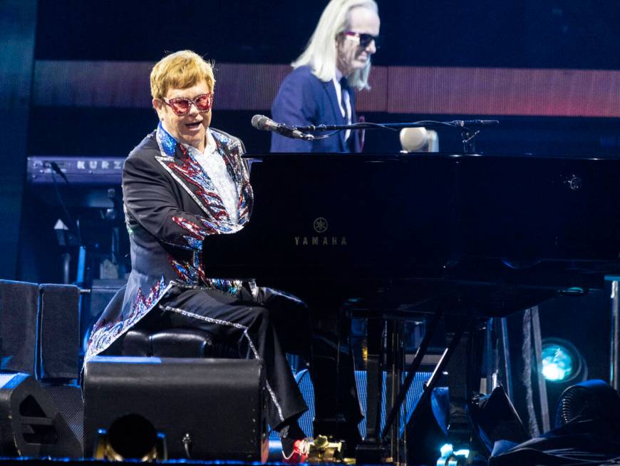 Elton John performs during his ''Farewell Yellow Brick Road,'' final tour at Allegiant Stadium, ...