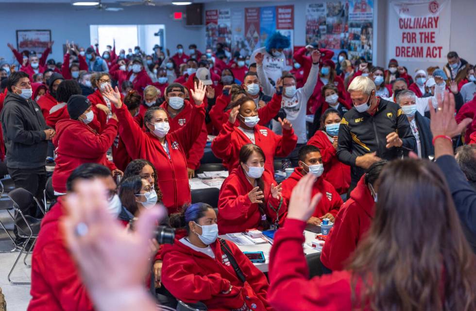 Culinary Union members get pumped up during a rally as efforts to knock on more than 1 million ...