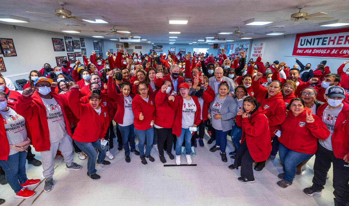 Culinary Union members get pumped up during a rally as efforts to knock on more than 1 million ...