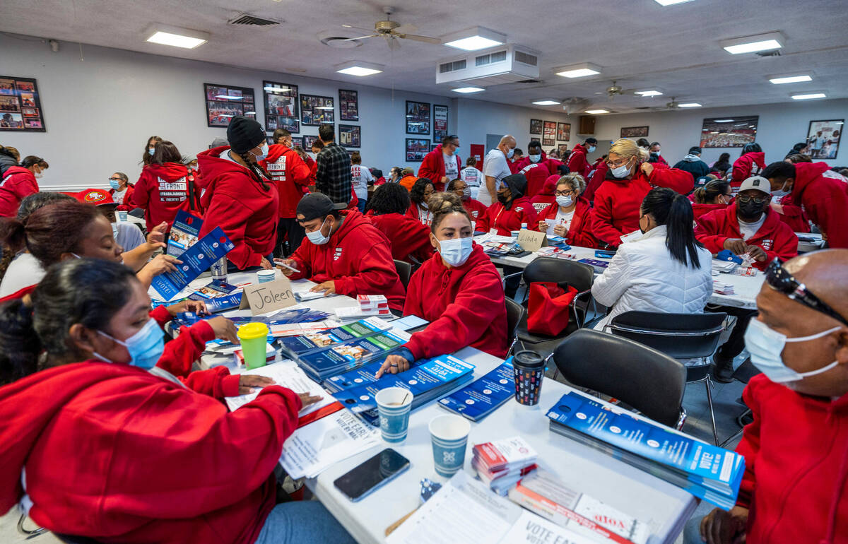 Culinary Union members gather voting materials as they ready for more canvassing, the goal to k ...