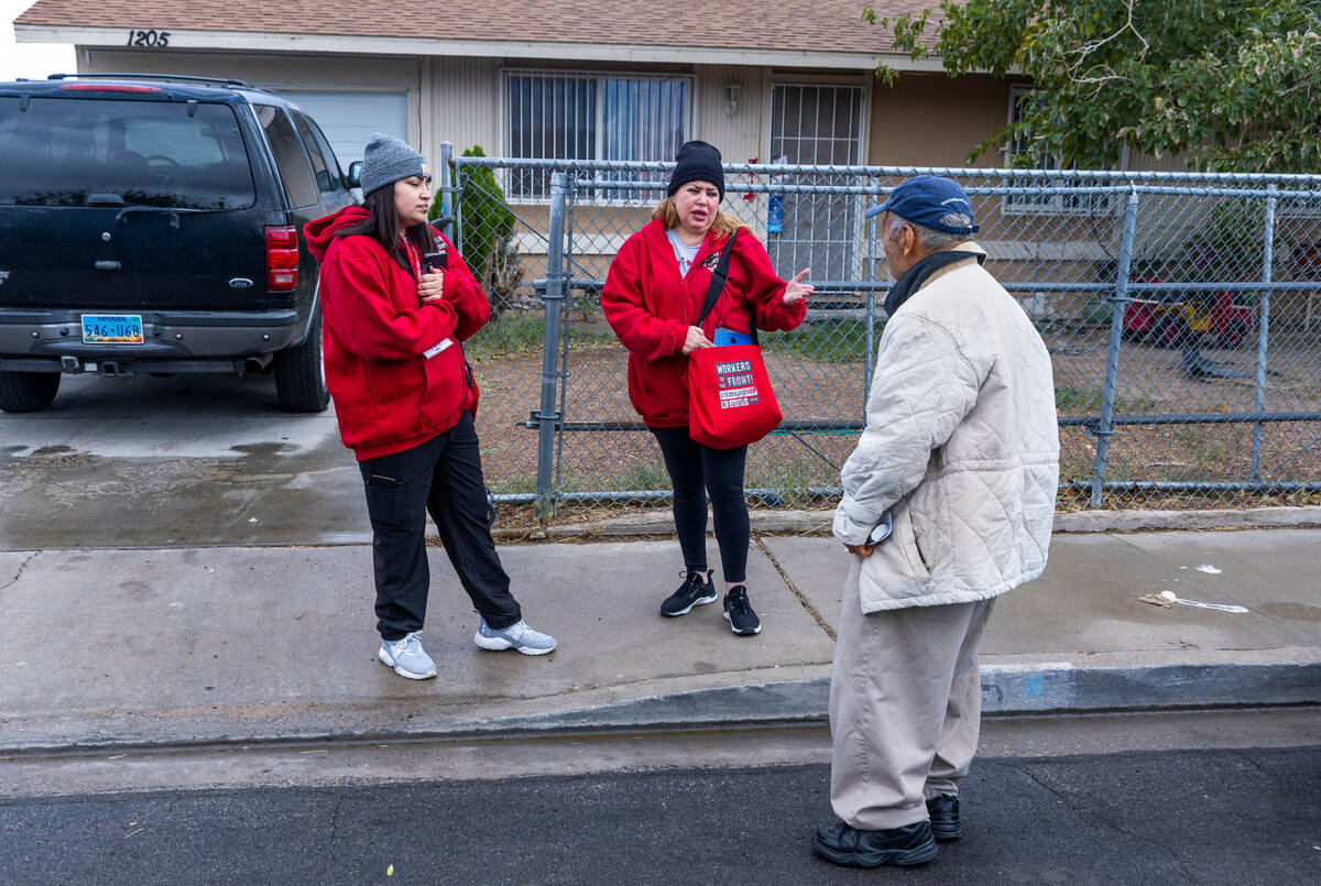 Mirian Cervantes, center, and her daughter Arlett Tovar, left, with the Culinary Union, talk ab ...