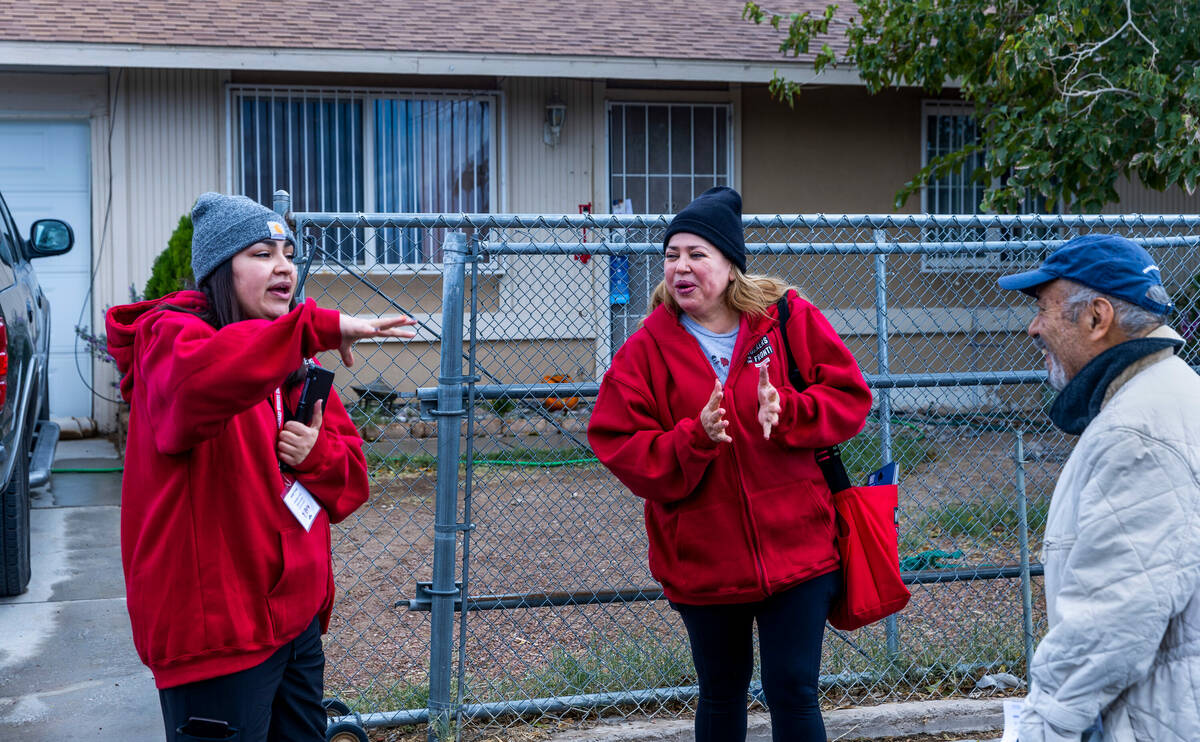 Arlett Tovar, left, and her mother Mirian Cervantes, center, with the Culinary Union, talk abou ...