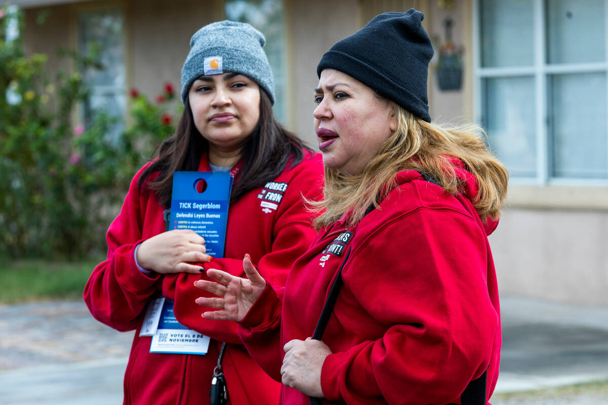 Mirian Cervantes, left, and her daughter Arlett Tovar, with the Culinary Union, talk about vote ...