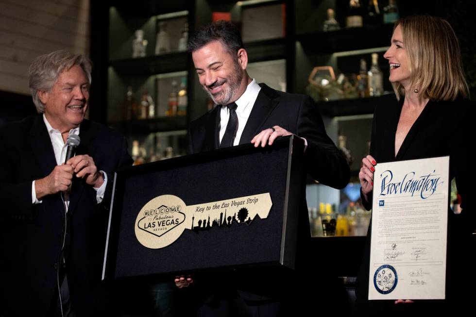 Clark County Commissioner Tick Segerblom, left, presents Jimmy Kimmel with a key to the Las Veg ...