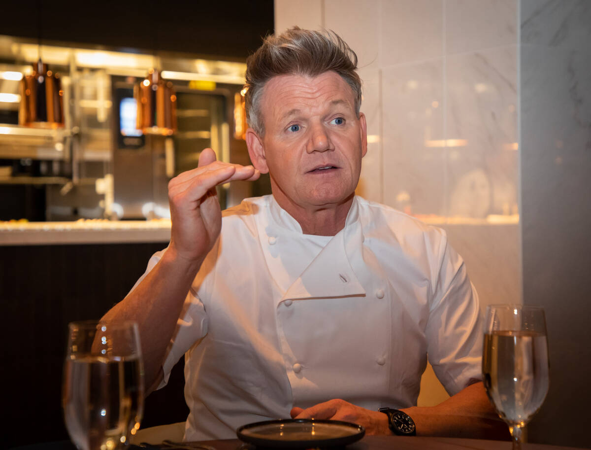 Chef Gordon Ramsay discusses his new Ramsay's Kitchen with invited guests at the restaurant, op ...