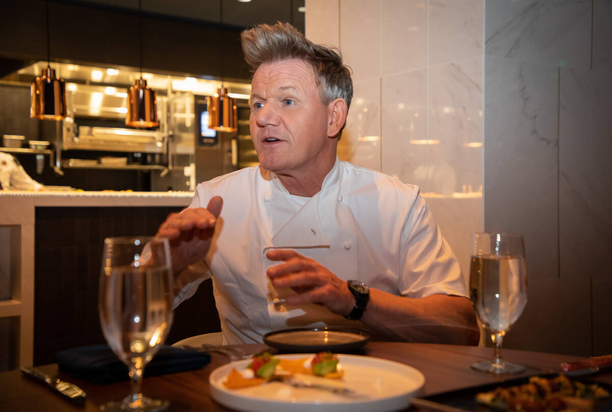 Chef Gordon Ramsay discusses his new Ramsay's Kitchen with invited guests at the restaurant, op ...