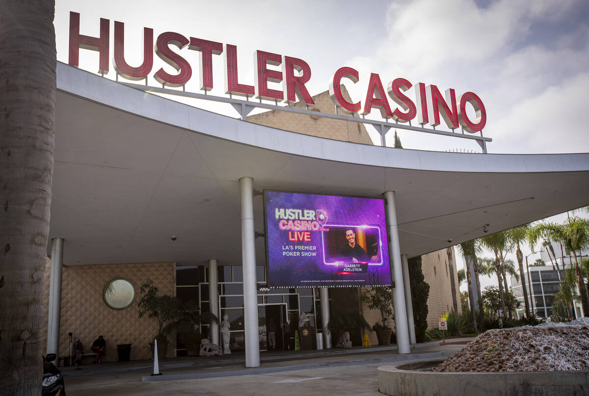 An image of poker pro Garrett Adelstein is displayed on a digital display at Hustler Casino on ...