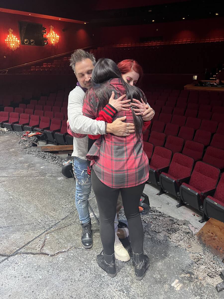 Travis Cloer, Laura Wright and Anne Martinez hug it out after Las Vegas shaman Jen Heartfire's ...