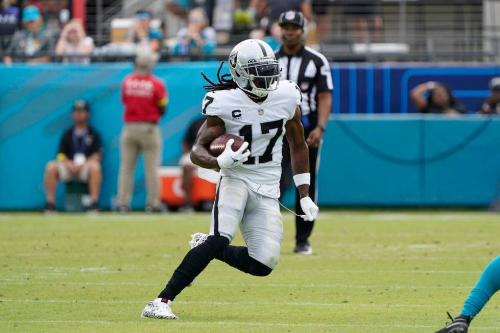 Las Vegas Raiders wide receiver Davante Adams (17) plays against the Jacksonville Jaguars in th ...