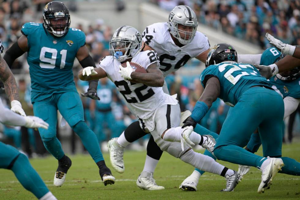 Las Vegas Raiders running back Ameer Abdullah (22) carries the ball against the Jacksonville Ja ...