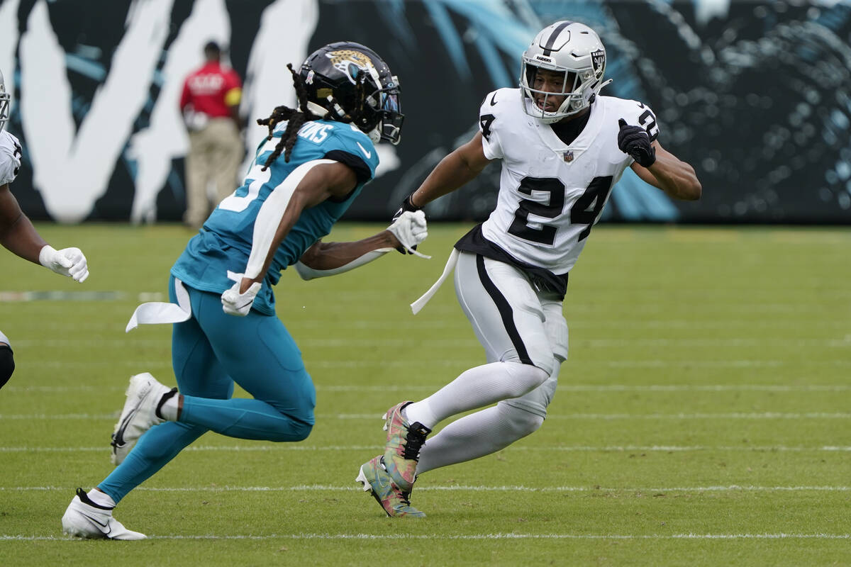 Las Vegas Raiders' Johnathan Abram (24) covers Jacksonville Jaguars' Chris Claybrooks (6) on a ...