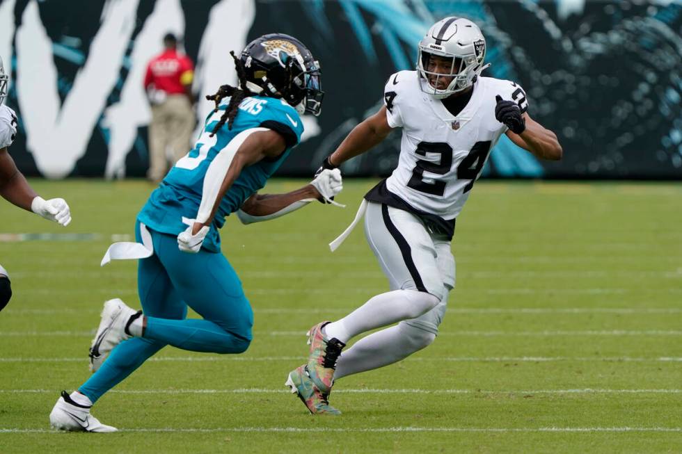 Las Vegas Raiders' Johnathan Abram (24) covers Jacksonville Jaguars' Chris Claybrooks (6) on a ...