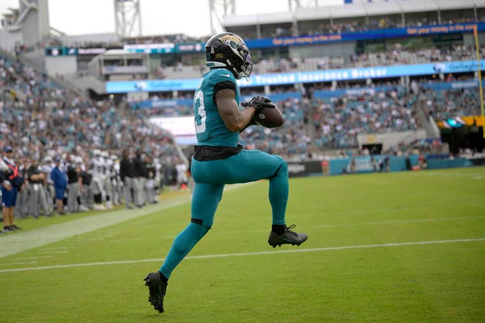 Jacksonville Jaguars wide receiver Christian Kirk catches a touchdown pass against the Las Vega ...