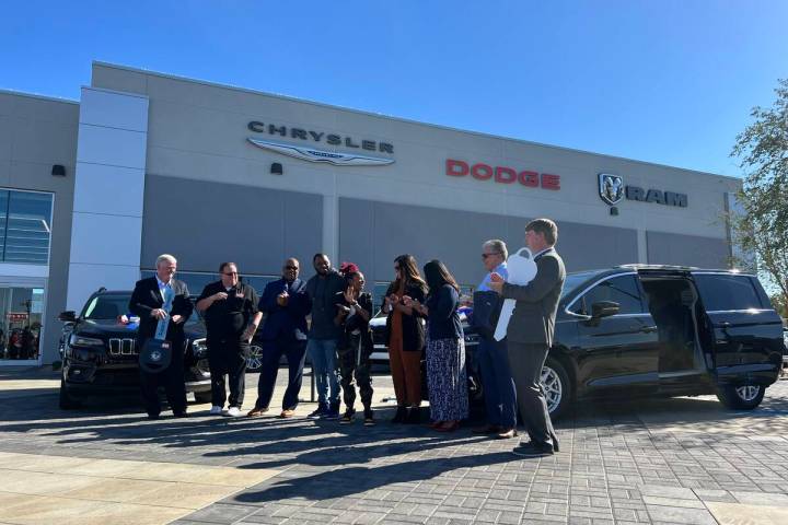 Attending the key presentation at Chapman Dodge Chrysler Jeep Ram are Tom Kilgannon, Freedom Al ...