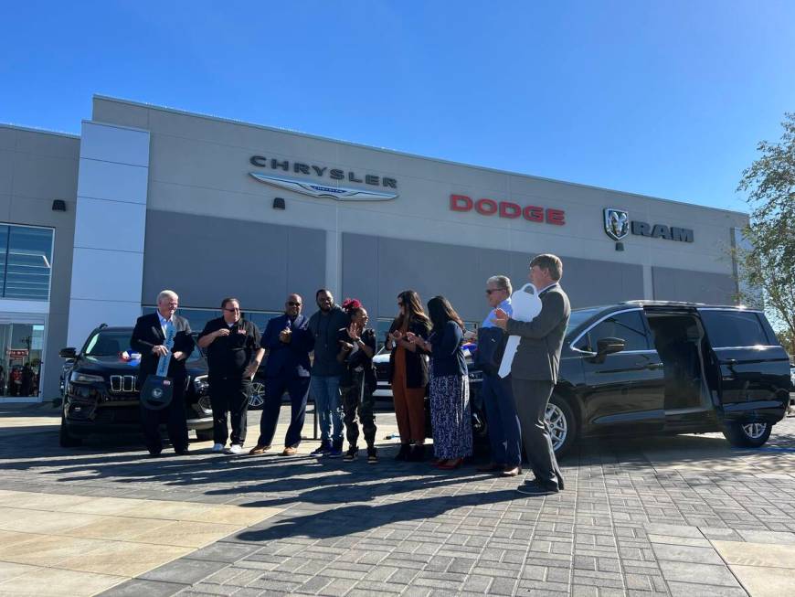 Attending the key presentation at Chapman Dodge Chrysler Jeep Ram are Tom Kilgannon, Freedom Al ...