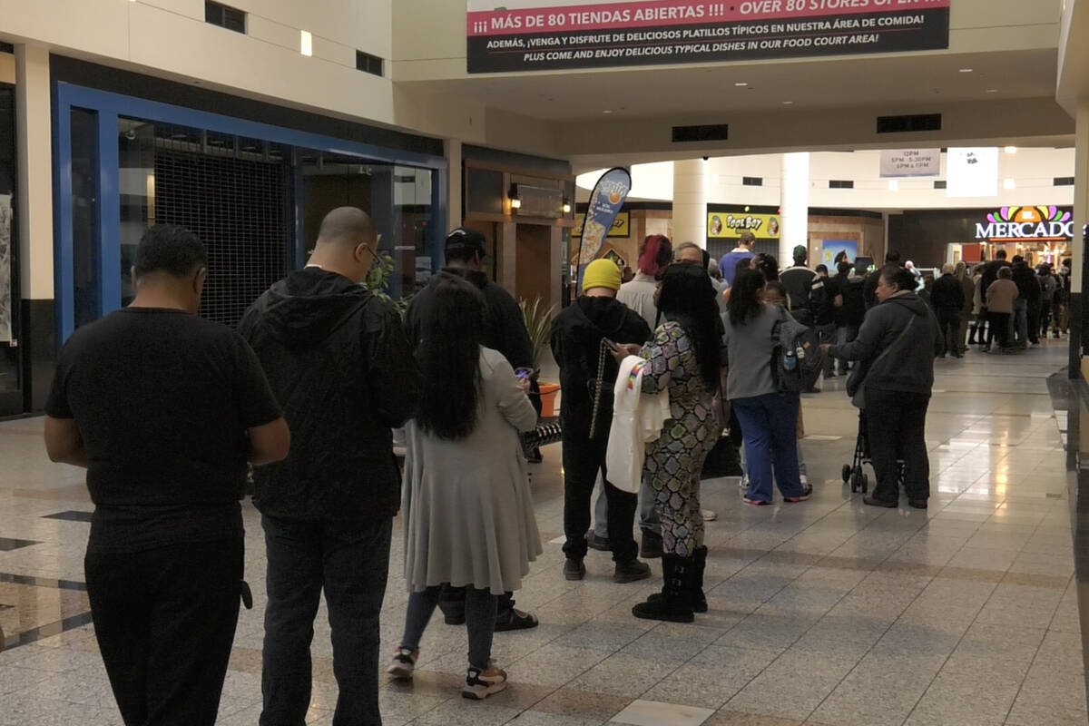 People wait in line to vote at Boulevard Mall in Las Vegas on Tuesday, Nov. 8, 2022. (Ethan Sto ...