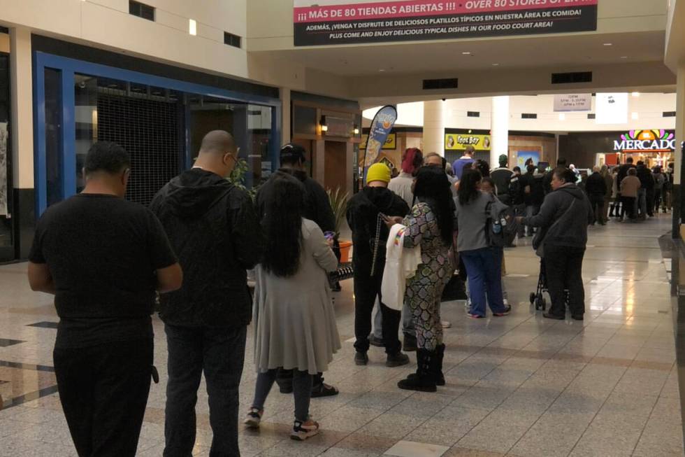 People wait in line to vote at Boulevard Mall in Las Vegas on Tuesday, Nov. 8, 2022. (Ethan Sto ...