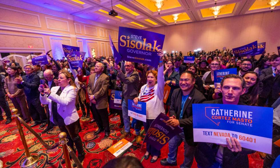 Supporters cheer as Senator Catherine Cortez Masto and Governor Steve Sisolak speak during the ...