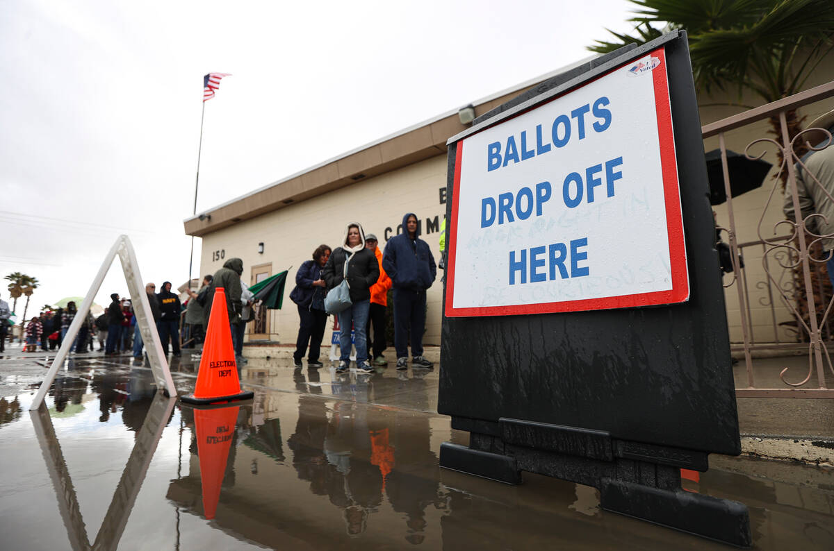 Nye County voters line up to cast their ballots on Election Day at Bob Ruud Community Center in ...