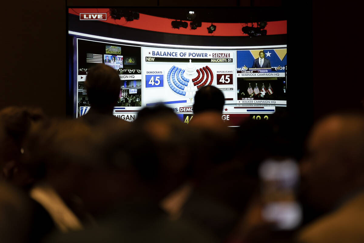 Fox News airs election results during a GOP watch party at Red Rock Casino on Tuesday, Nov. 8, ...