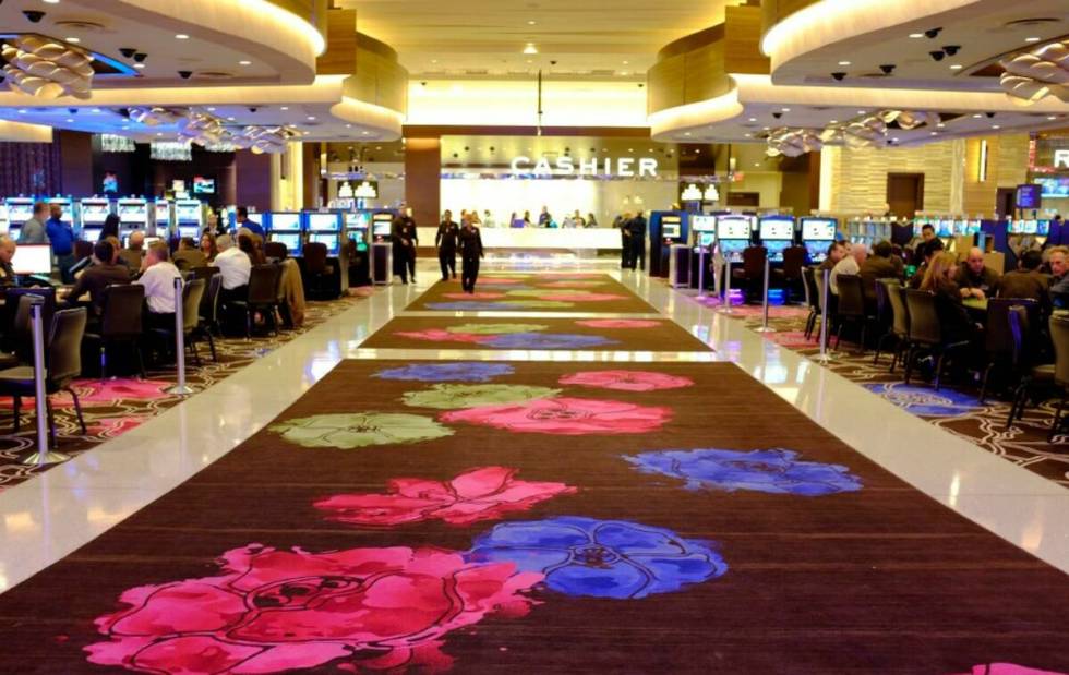 People gamble inside Graton Resort and Casino in Rohnert Park, Calif., in 2013. (AP Photo/Eric ...