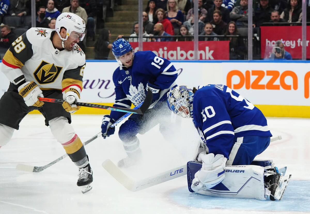 Toronto Maple Leafs goaltender Erik Kallgren (50) makes a save on Vegas Golden Knights forward ...