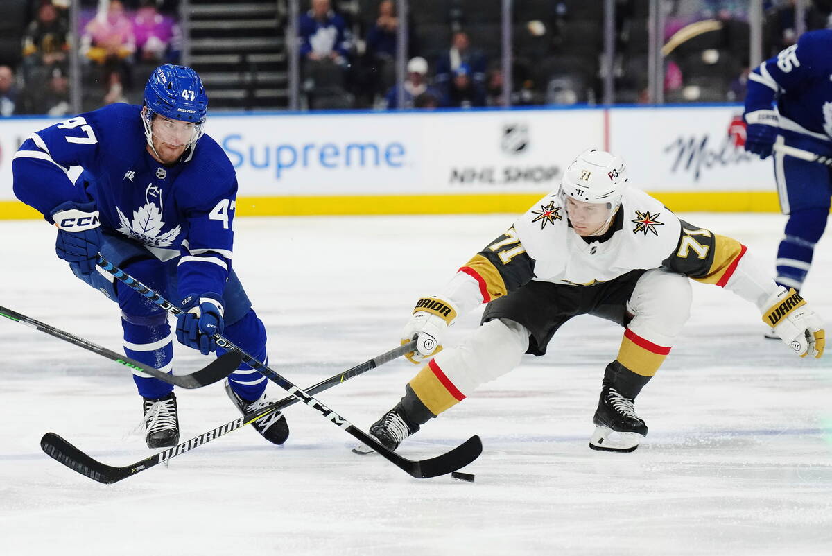 Toronto Maple Leafs forward Pierre Engvall (47) battles for the puck with Vegas Golden Knights ...