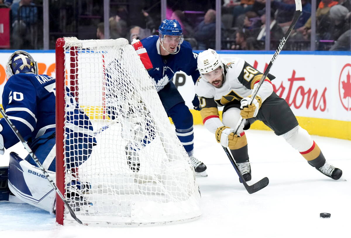 Vegas Golden Knights forward Chandler Stephenson (20) chases down the loose puck against Toront ...