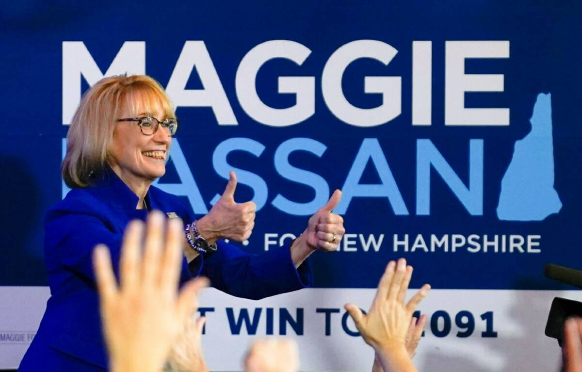 Sen. Maggie Hassan, D-N.H., gives two thumbs up to supporters during an election night campaign ...