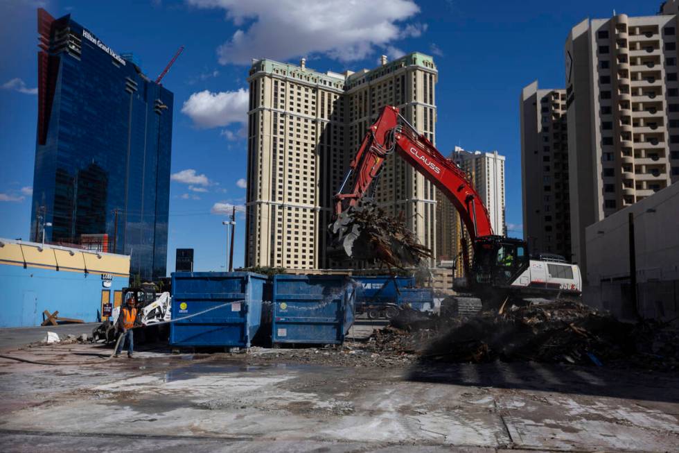 Demolition crews clean up the site of what used to be the Travelodge motel on the Strip, 3735 L ...