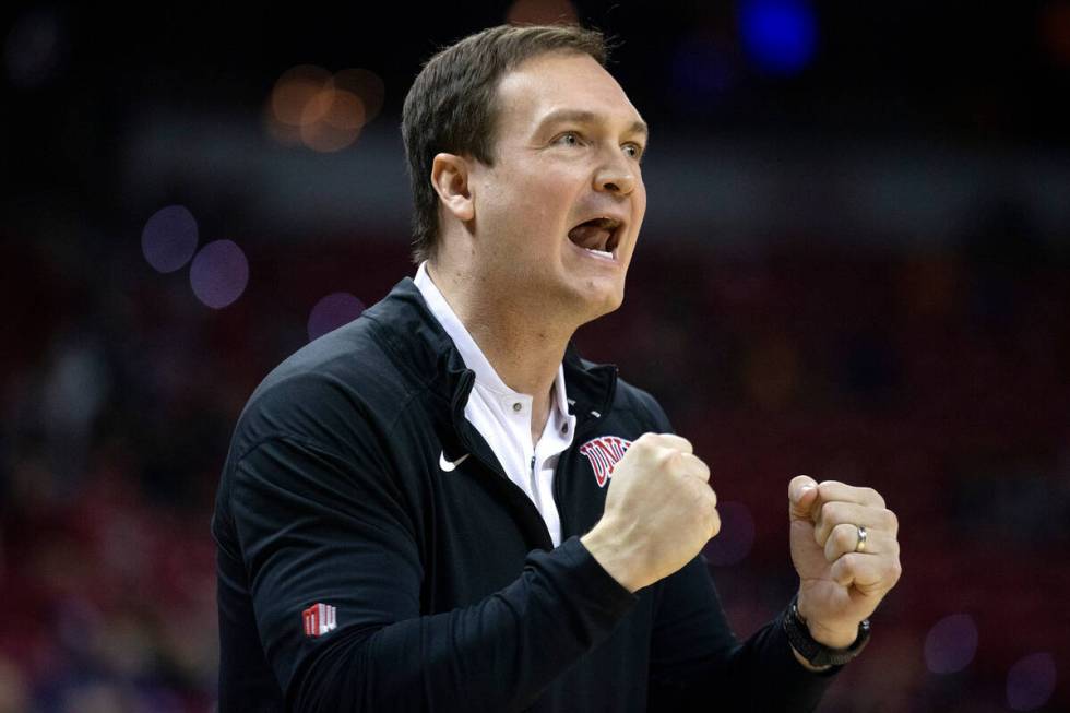 UNLV Rebels head coach Kevin Kruger shouts from the sidelines after UNLV Rebels forward Royce H ...