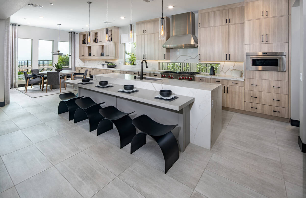 This kitchen in Pulte Homes' Carmel Cliff home has a Vittoria floor plan and a modern design. ( ...
