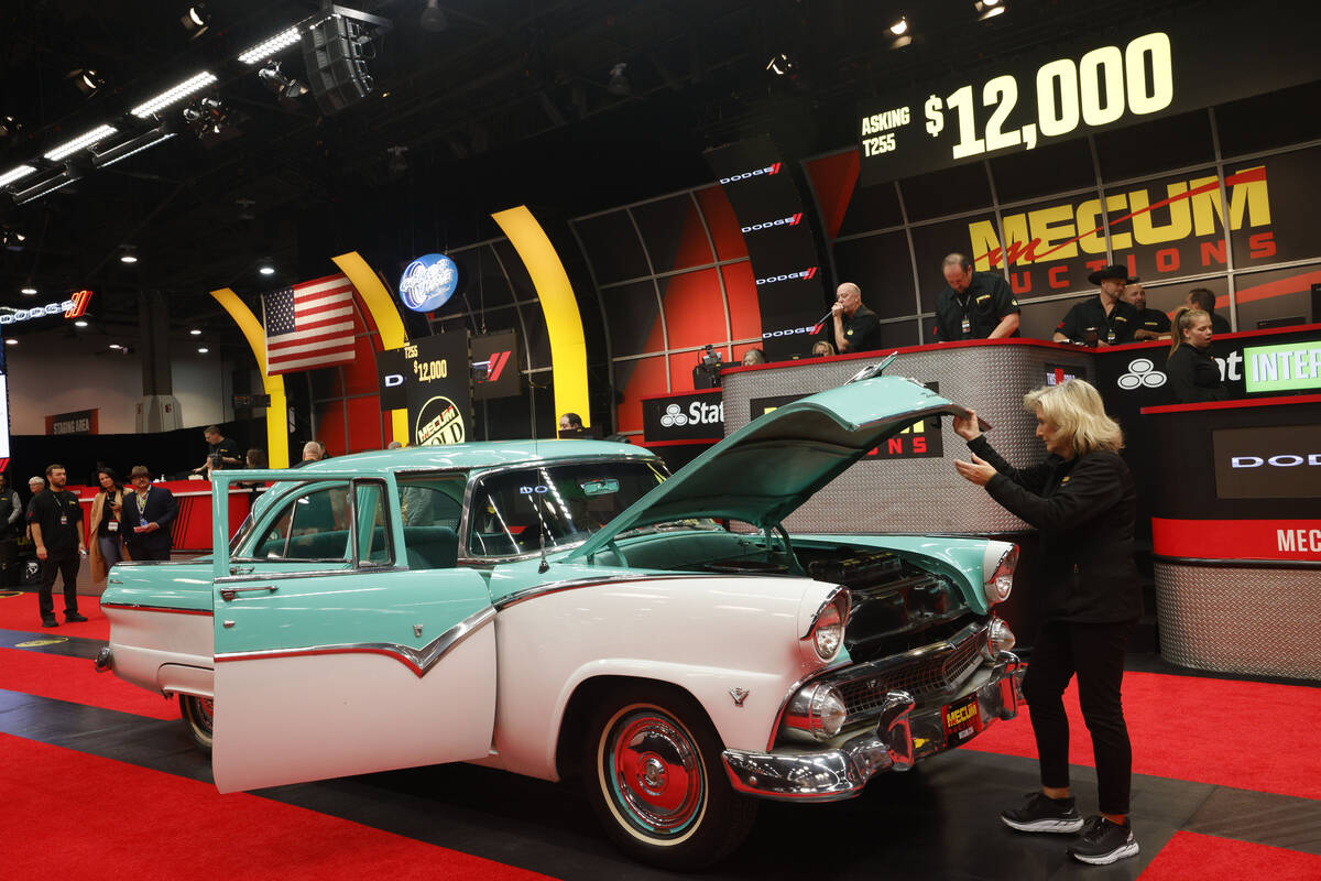A 1955 Ford Fairlane Sedan is seen on the auction block during Mecum Las Vegas auction at the L ...