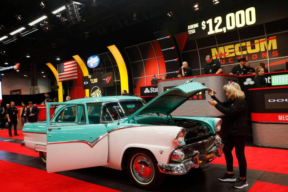 A 1955 Ford Fairlane Sedan is seen on the auction block during Mecum Las Vegas auction at the L ...