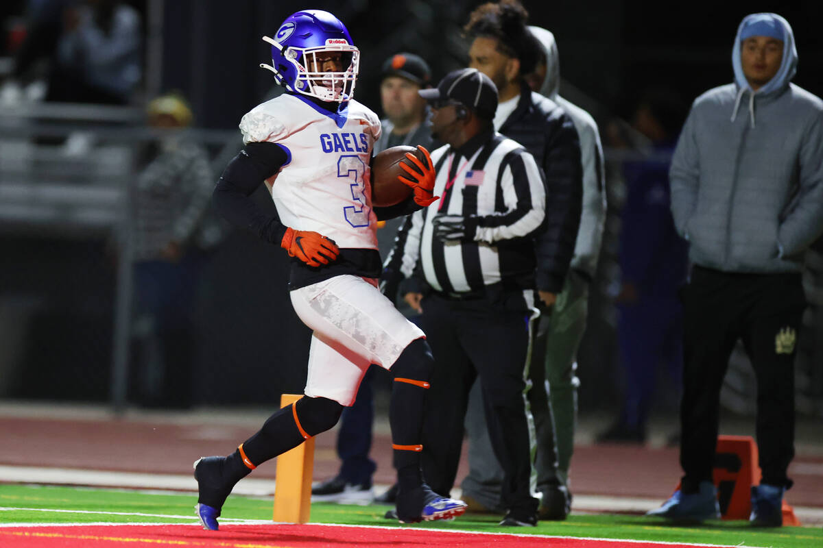 Bishop Gorman's Devon Rice (3) runs the ball for a touchdown during the first half of the footb ...