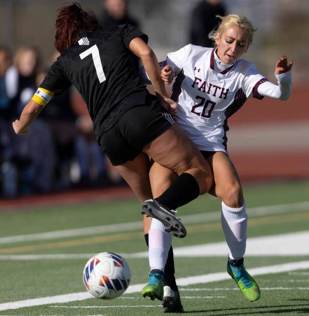 Faith Lutheran’s Ava Gardner (20) attempts to pass while colliding with Galena’s ...