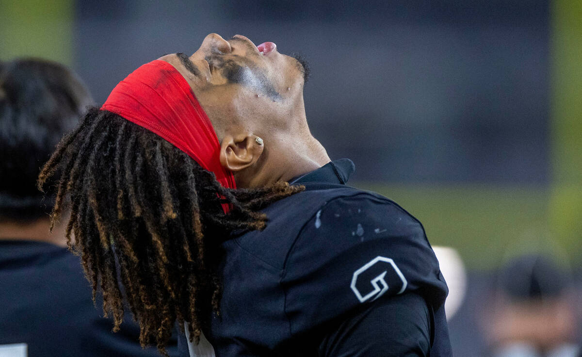 UNLV Rebels quarterback Doug Brumfield (2) throws his head back on the sidelines the Fresno Sta ...