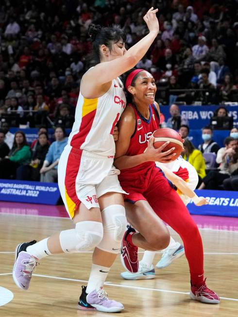 United States' A'ja Wilson, right, pushes into China's Li Yueru during their gold medal game at ...