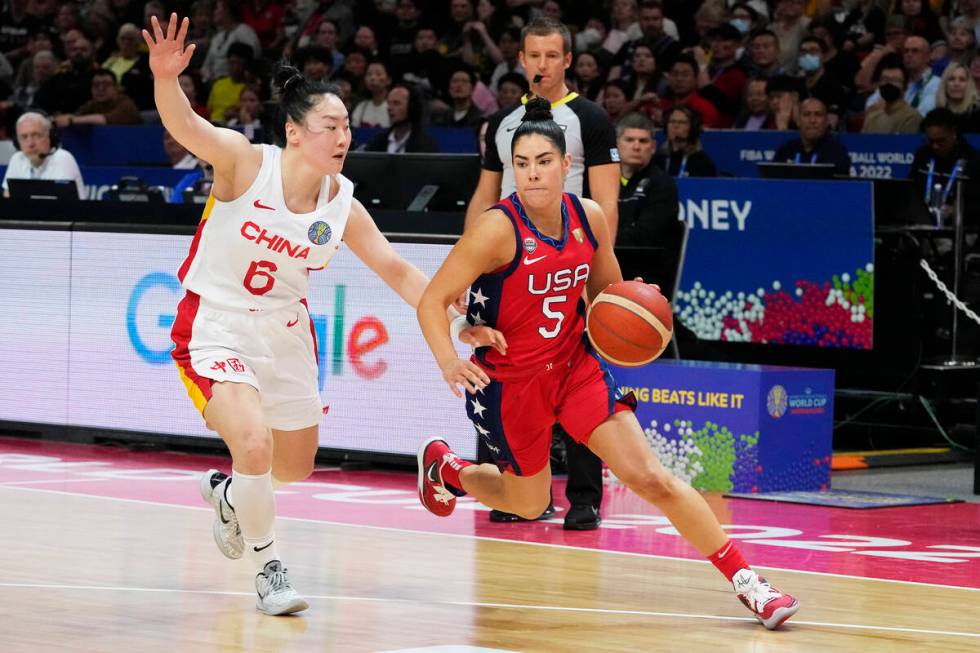 United States' Kelsey Plum runs past China's Wu Tongtong during their gold medal game at the wo ...