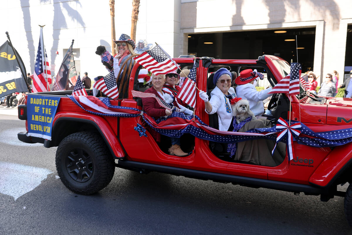 The Daughters of the American Revolution float in the Veterans Day parade on Fourth Street in d ...