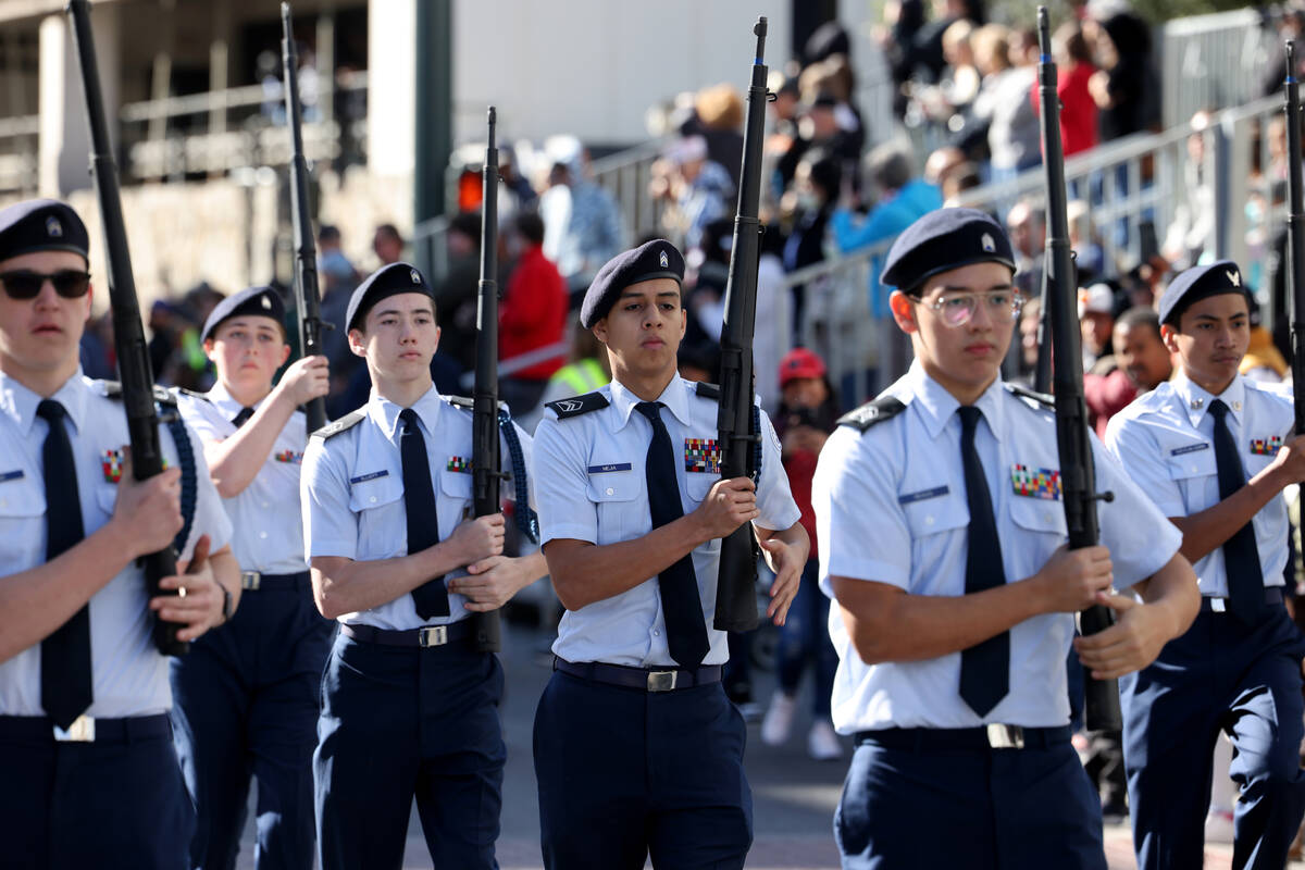 Rancho High School Air Force Junior ROTC members march in the Veterans Day parade on Fourth Str ...