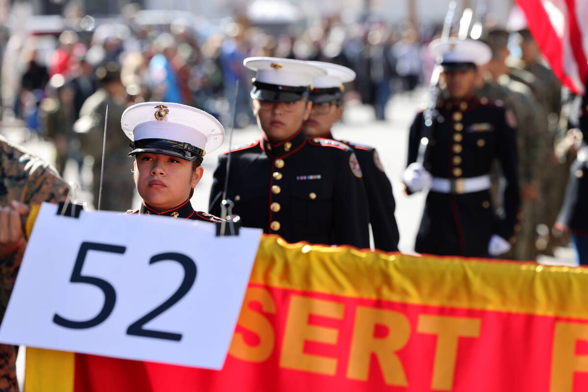Desert Pines High School Marine Junior ROTC members march in the Veterans Day parade on Fourth ...