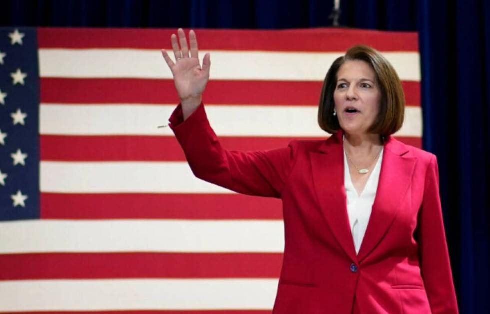 Sen. Catherine Cortez Masto, D-Nev., walks on stage during a rally with former President Barack ...