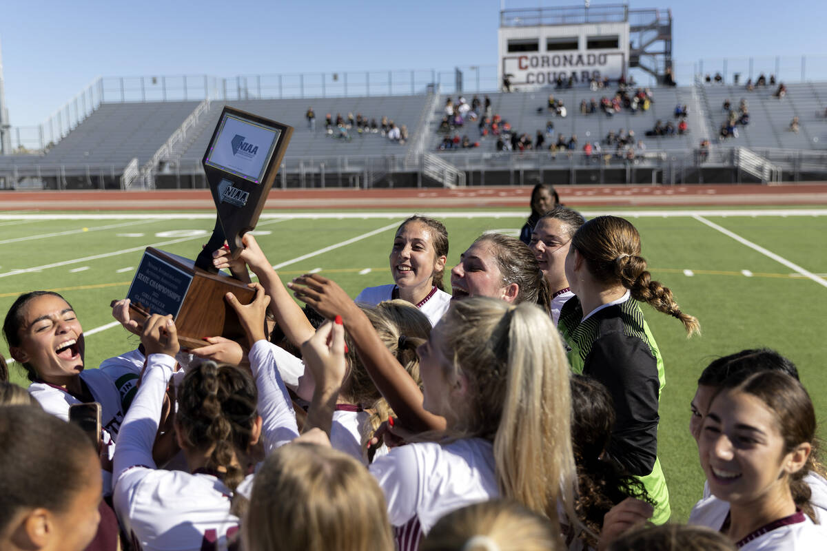 Faith Lutheran celebrates after winning the Class 5A girls high school soccer state championshi ...