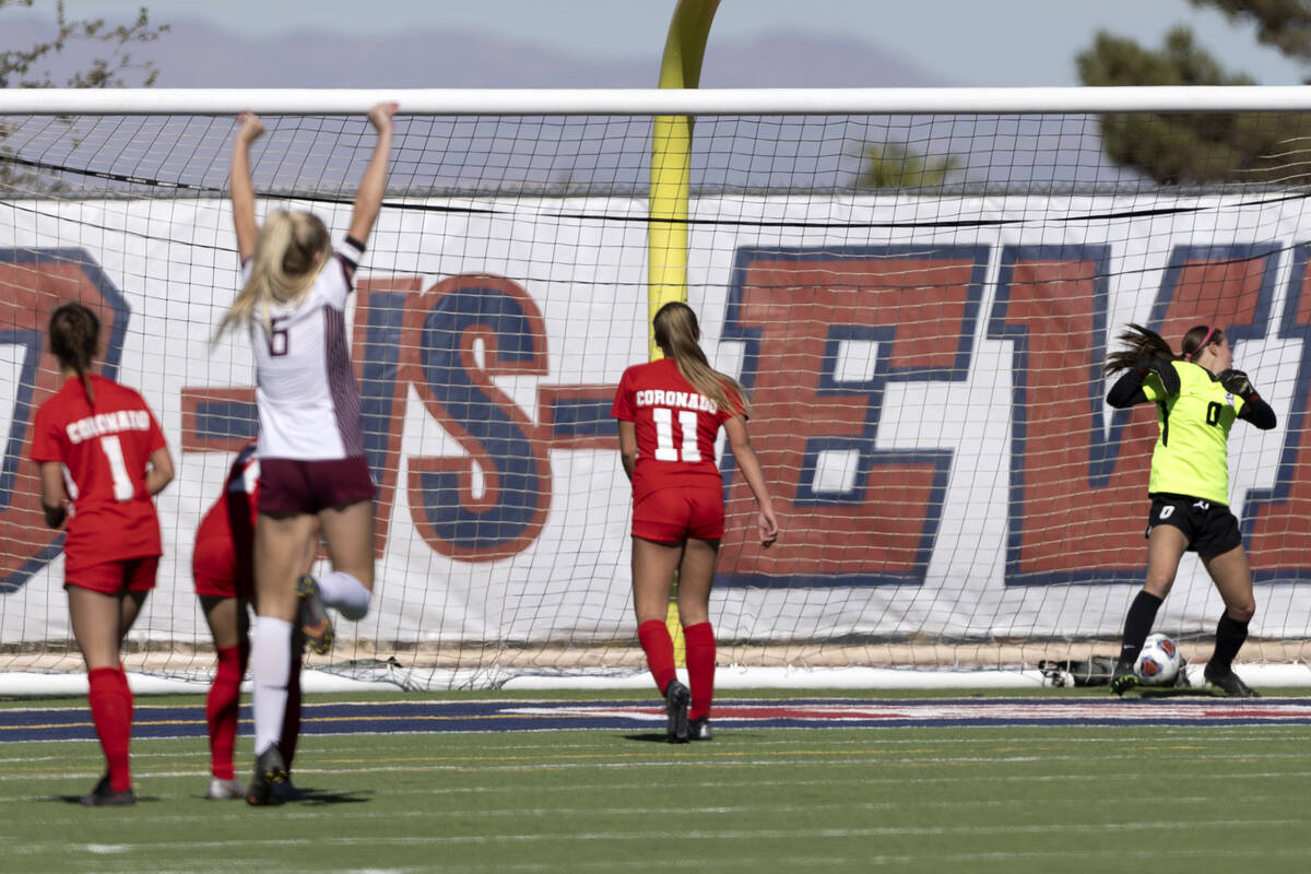 Faith Lutheran’s Brooklyn Maier (6) celebrates as she scores the game-winning goal while ...