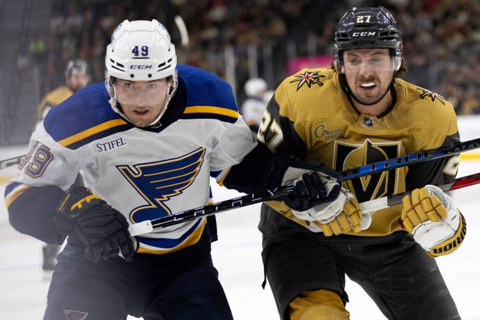 St. Louis Blues center Ivan Barbashev (49) skates against Vegas Golden Knights defenseman Shea ...