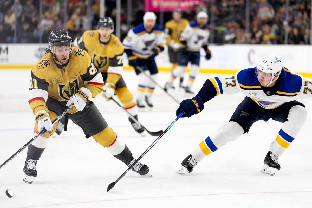 Vegas Golden Knights center Jonathan Marchessault (81) winds up to shoot on goal while St. Loui ...