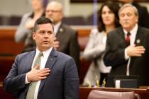 Assembly members, including Assemblyman Steve Yeager, D-Las Vegas, left, recite the Pledge of A ...