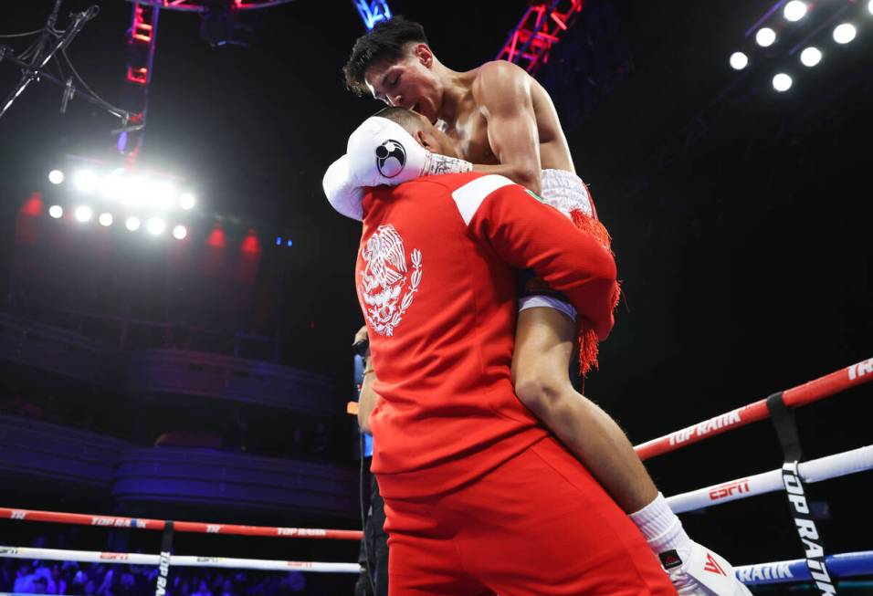 Emiliano Fernando Vargas, right, with his father Fernando Vargas, celebrates his knockout win a ...