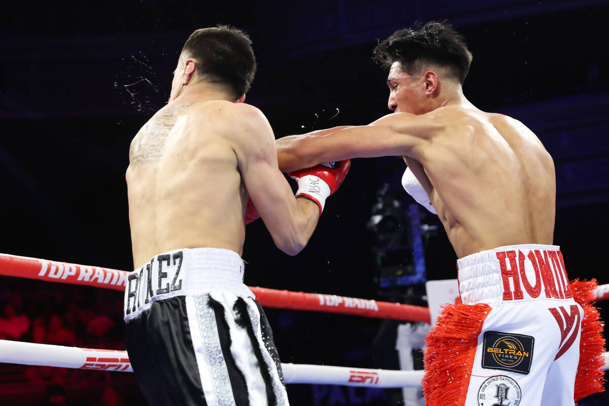 Emiliano Fernando Vargas, right, connects a punch against Julio Cesar Martinez to knock him out ...